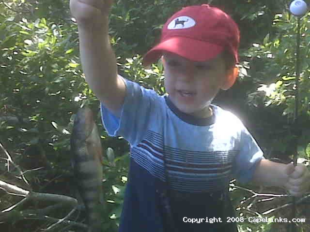 a boy's first fish