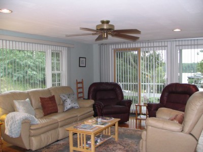 Livingroom looking out over the deck to the pond waterviews-of-follins-pond-sleeps-up-to-10_willymr